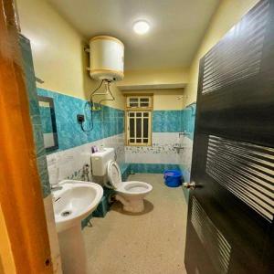 Koupelna v ubytování BroZ Nazom Retreat Gangtok