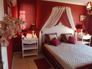 Ένα ή περισσότερα κρεβάτια σε δωμάτιο στο La Maison Jaune