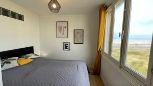 Katil atau katil-katil dalam bilik di Appartement Cocoon - Face mer - Stella-Plage