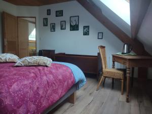 Postel nebo postele na pokoji v ubytování Au pied de la colline