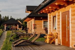 Vonkajšia záhrada v ubytovaní Drewniana Osada w Górach Polne Domki