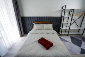 Postel nebo postele na pokoji v ubytování Merkuri apartments