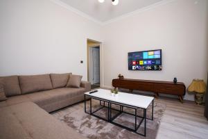 TV a/nebo společenská místnost v ubytování Merkuri apartments