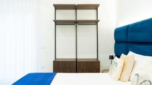 Letto o letti in una camera di Aries Suite Pompei