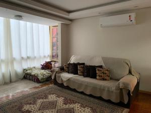 Postel nebo postele na pokoji v ubytování Apto aconchegante com 3 dormitorios bem localizado