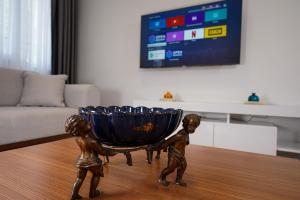 TV a/nebo společenská místnost v ubytování Merkuri apartments