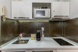 Küche/Küchenzeile in der Unterkunft Prive Apartment