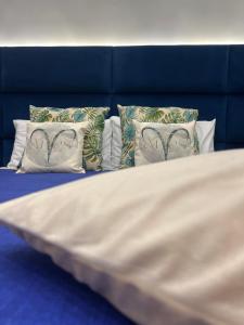 Letto o letti in una camera di Aries Suite Pompei