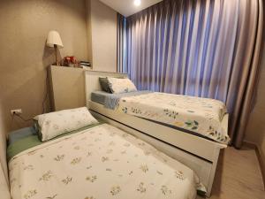 Postel nebo postele na pokoji v ubytování Family Suit 2 Bedrooms 2 Bathrooms in Chiang Mai