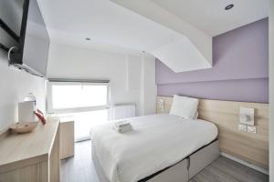 Postel nebo postele na pokoji v ubytování 06.Studio#Charenton#Fitness#Cinema