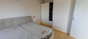 a small bedroom with a bed in a room at Moon in Pignataro Maggiore