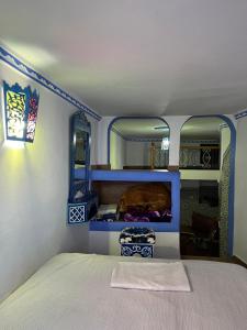 En eller flere senge i et værelse på Meftah’s house