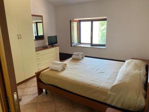 Postel nebo postele na pokoji v ubytování A CASA DI GIÒ & GIÒ