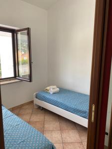 Postel nebo postele na pokoji v ubytování A CASA DI GIÒ & GIÒ