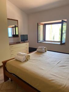 Postel nebo postele na pokoji v ubytování A CASA DI GIÒ & GIÒ
