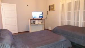 HOSTAL HOUSE REYMON,habitaciones privadas" precio por persona" 객실 침대