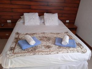 Een bed of bedden in een kamer bij Hostal JC