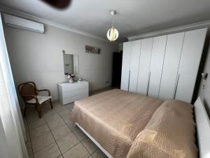 Кровать или кровати в номере Appartamento Anastasia