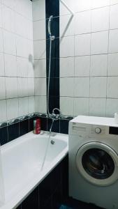 Phòng tắm tại Затишна квартира в центрі Калуша