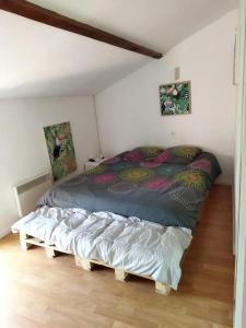 Cama ou camas em um quarto em Maison familiale Nantes Sud