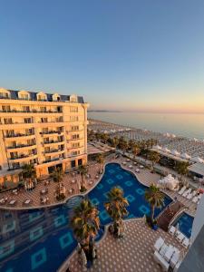 an aerial view of a resort with a swimming pool at Alb's Apartment 2 in Golem