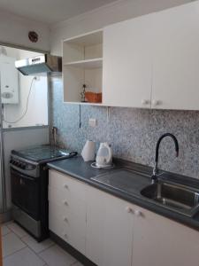 A kitchen or kitchenette at Condominio Mirador de Coquimbo