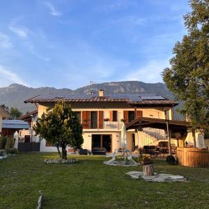 a large house with a lawn in front of it at Giraluna in Demonte