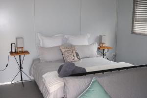 Ένα ή περισσότερα κρεβάτια σε δωμάτιο στο Zen-Inn Guesthouse