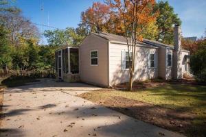 a small white house with a driveway at Birmingham Home/2BR/Close to everything! in Birmingham