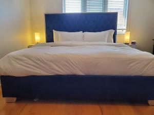 Postel nebo postele na pokoji v ubytování RAESABU GUEST HOUSE