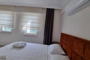 Postel nebo postele na pokoji v ubytování Dalyan Villa Hannibal