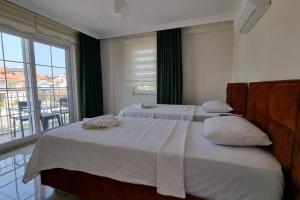 Postel nebo postele na pokoji v ubytování Dalyan Villa Hannibal + 35 fotografií