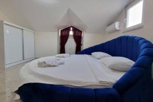Postel nebo postele na pokoji v ubytování Dalyan Villa Hannibal