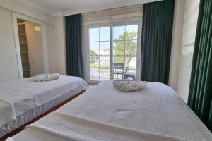 Postel nebo postele na pokoji v ubytování Dalyan Villa Hannibal