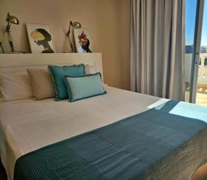 A bed or beds in a room at El ático de Concha