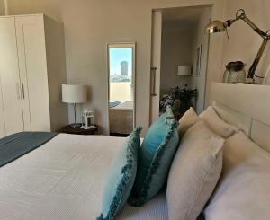 A bed or beds in a room at El ático de Concha