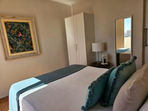A bed or beds in a room at El ático de Concha