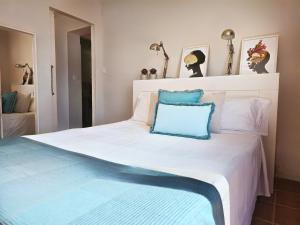 A bed or beds in a room at El ático de Concha