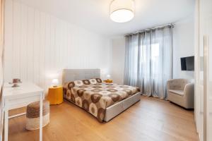 Postel nebo postele na pokoji v ubytování Il Noce Appartamento 2