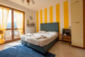 Posteľ alebo postele v izbe v ubytovaní Happy Guest Apartments - Lake Panorama & Pool