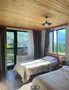 Postel nebo postele na pokoji v ubytování Lastili Inn Hotel