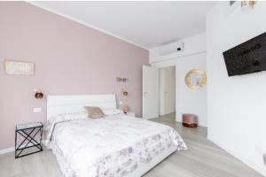 Postel nebo postele na pokoji v ubytování Casa di Kiki