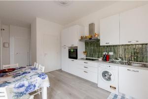 Kuchyň nebo kuchyňský kout v ubytování Casa di Kiki