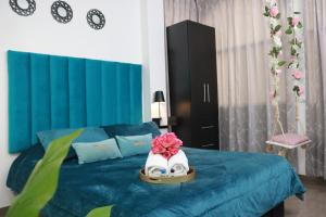 Postel nebo postele na pokoji v ubytování SUITES FullHouse