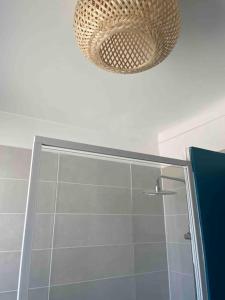 a bathroom with a shower and a ceiling at Torreilles-Casa terracota-plage - visa image- les déferlantes le Barcares - South of France in Torreilles