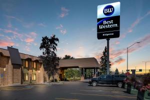 a best western sign in front of a store at Best Western Bridgeview Hotel in Superior