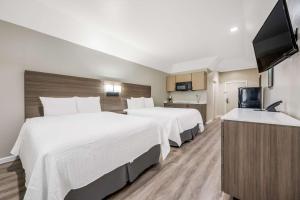 Letto o letti in una camera di SureStay Studio by Best Western Conroe Downtown