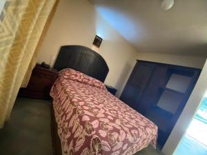 Postel nebo postele na pokoji v ubytování Hotel D´ Alba