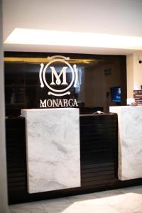 a sign for a moroccan store in a building at HOTEL BOUTIQUE MONARCA in El Paraíso