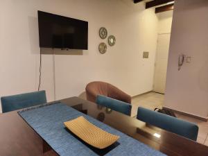 TV a/nebo společenská místnost v ubytování Apartamento Deluxe Senderos del Vino III, Desayuno Opcional